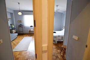 Posteľ alebo postele v izbe v ubytovaní Letmalaga Casa Gibralfaro