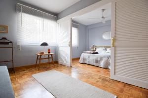 Posteľ alebo postele v izbe v ubytovaní Letmalaga Casa Gibralfaro