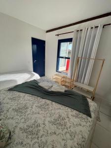 Cama o camas de una habitación en Casa Delfi, Hermosa vista, Jacuzzi e Praia , Buzios