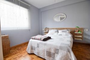 Posteľ alebo postele v izbe v ubytovaní Letmalaga Casa Gibralfaro