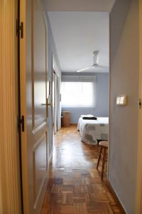 Posteľ alebo postele v izbe v ubytovaní Letmalaga Casa Gibralfaro