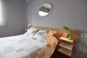 Posteľ alebo postele v izbe v ubytovaní Letmalaga Casa Gibralfaro