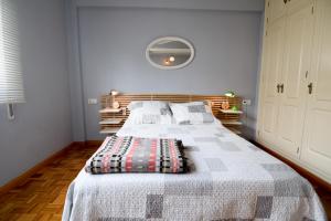 Posteľ alebo postele v izbe v ubytovaní Letmalaga Casa Gibralfaro