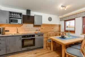 Kuchyň nebo kuchyňský kout v ubytování Das kleine Bio Hotel Tiefenbach