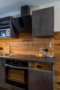 Kuchyň nebo kuchyňský kout v ubytování Das kleine Bio Hotel Tiefenbach