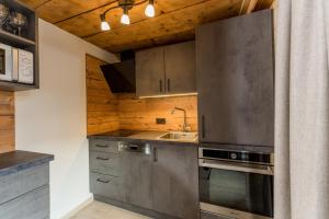 Kuchyň nebo kuchyňský kout v ubytování Das kleine Bio Hotel Tiefenbach