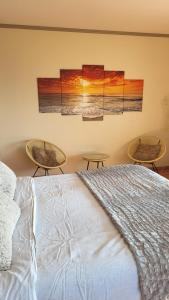 Postel nebo postele na pokoji v ubytování Villa Face Mer
