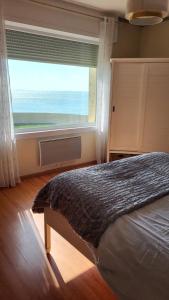 Postel nebo postele na pokoji v ubytování Villa Face Mer