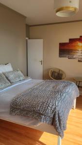 Postel nebo postele na pokoji v ubytování Villa Face Mer