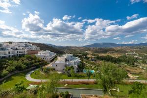 an aerial view of a city with white buildings at Penthouse with private pool in La Cala de Mijas