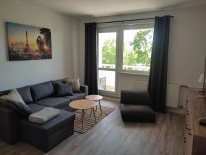 Posezení v ubytování Gästewohnung in Hohenstein-Ernstthal