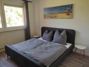 Postel nebo postele na pokoji v ubytování Gästewohnung in Hohenstein-Ernstthal
