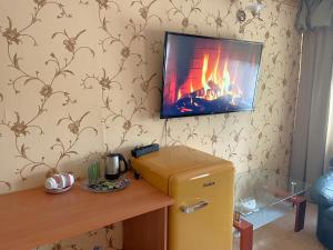 TV a/nebo společenská místnost v ubytování Riverside Motel Jelgava