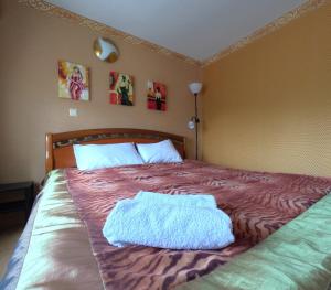 Postel nebo postele na pokoji v ubytování Riverside Motel Jelgava
