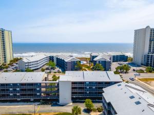 an aerial view of a city with buildings and the ocean at Sweet Caroline Remodeled with Partial Ocean View and Oceanfront Pool in Myrtle Beach