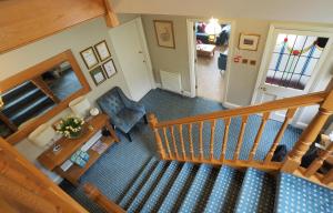 an overhead view of a living room with a staircase at Chestnuts House Boutique B&B in Bath