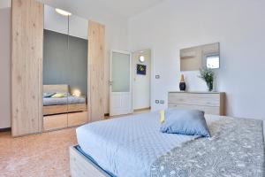 Postel nebo postele na pokoji v ubytování Boscoreale Vanilla Flats Free Parking