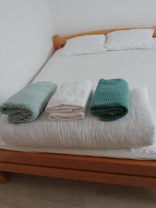 Postel nebo postele na pokoji v ubytování Apartman Bukulja
