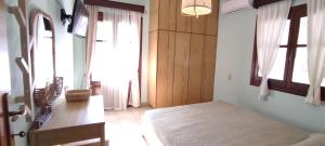 A bed or beds in a room at Nostra Casa di Hovolo