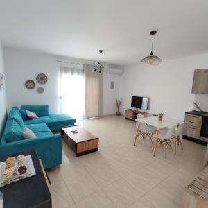 TV a/nebo společenská místnost v ubytování Infinity Suites