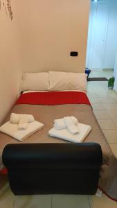 Letto o letti in una camera di La casetta di Virginia