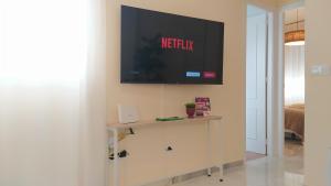 TV a/nebo společenská místnost v ubytování Sherryflat Fontana