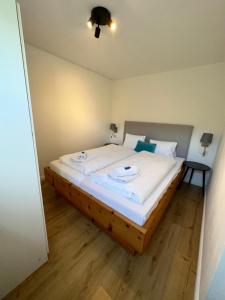 Postel nebo postele na pokoji v ubytování Kesselgrubs Apartements Ski & Badeglück