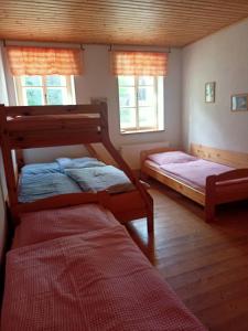 Postel nebo postele na pokoji v ubytování Chalupa Končiny