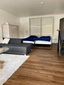 Postel nebo postele na pokoji v ubytování Wolburg
