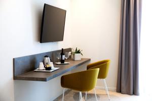 TV a/nebo společenská místnost v ubytování Hotel Cristallo