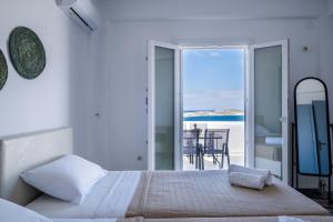 Ένα ή περισσότερα κρεβάτια σε δωμάτιο στο Sterna house
