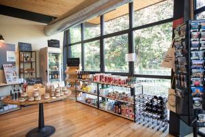 a store with a lot of products on display at CityKamp Lyon in Dardilly