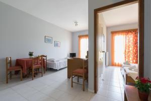 Postel nebo postele na pokoji v ubytování Ammousa Hotel Apartments