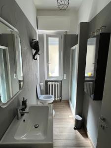 a bathroom with a sink and a toilet at Apartment 4 people in Rimini 400m from the beach in Rimini