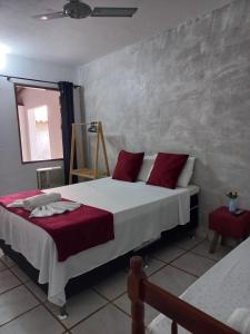 Postel nebo postele na pokoji v ubytování Villa dos Pássaros Paraty Hospedagem