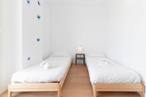 Posteľ alebo postele v izbe v ubytovaní Global Properties, Apartamento con terraza y vistas al mar