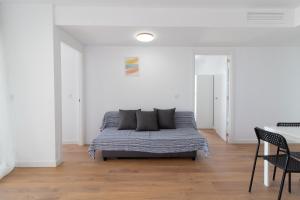 Posedenie v ubytovaní Global Properties, Apartamento con terraza y vistas al mar