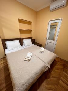 Postel nebo postele na pokoji v ubytování Hotel BANI