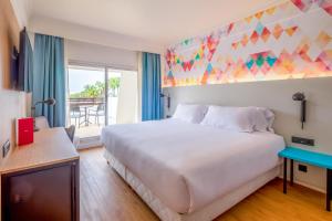 Letto o letti in una camera di Allegro Agadir