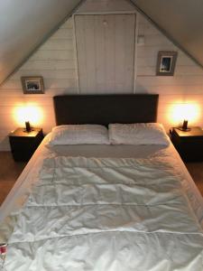 Кровать или кровати в номере La petite saugère