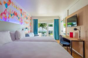 Letto o letti in una camera di Allegro Agadir