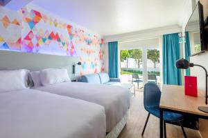 Letto o letti in una camera di Allegro Agadir