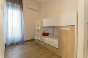 Cama o camas de una habitación en APARTAMENTOS MAPAMUNDI