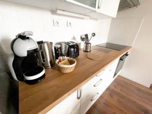 Imagen de la galería de Spacieux duplex central avec terrasse tropézienne, en Salon-de-Provence