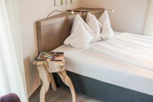 Posteľ alebo postele v izbe v ubytovaní Boutiquehotel Minigolf