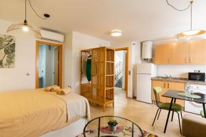 Kuchyňa alebo kuchynka v ubytovaní Teatro Suites Málaga CITY FLAT