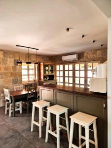 a kitchen with a table and chairs and a counter at NEW 2023 Villa Tree of Life in Sveti Petar