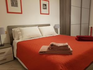 A bed or beds in a room at Your Comfort Home - Bologna