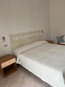 Voodi või voodid majutusasutuse Accogliente Bilocale con Vista Mozzafiato a Forio d'Ischia toas