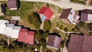 an overhead view of a group of houses and trees at Villa Krompir in Tetovo